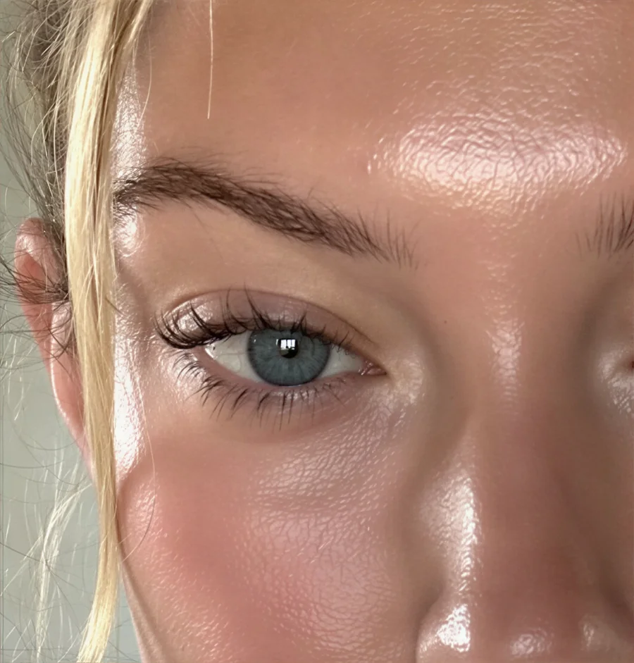Extreme close-up of an AI-generated eye and skin